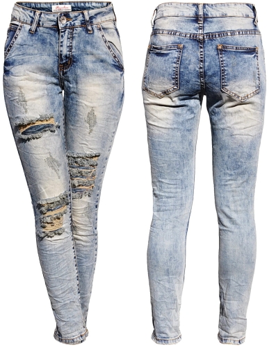 Spodnie Damskie Jeans Slim-Fit SKINNY Przecierane Dekatyzowane Dziury Stan Normalny model #S004 na Wiosnę Lato Jesień Zimę w sklepie FASHIONAVENUE.PL 