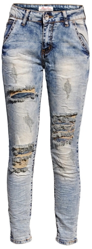 Spodnie Damskie Jeans Slim-Fit SKINNY Przecierane Dekatyzowane Dziury Stan Normalny model #S004 na Wiosnę Lato Jesień Zimę w sklepie FASHIONAVENUE.PL 